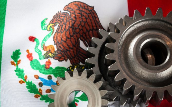 mexican flag with mechanic wheels or gears - what is nearshoring article