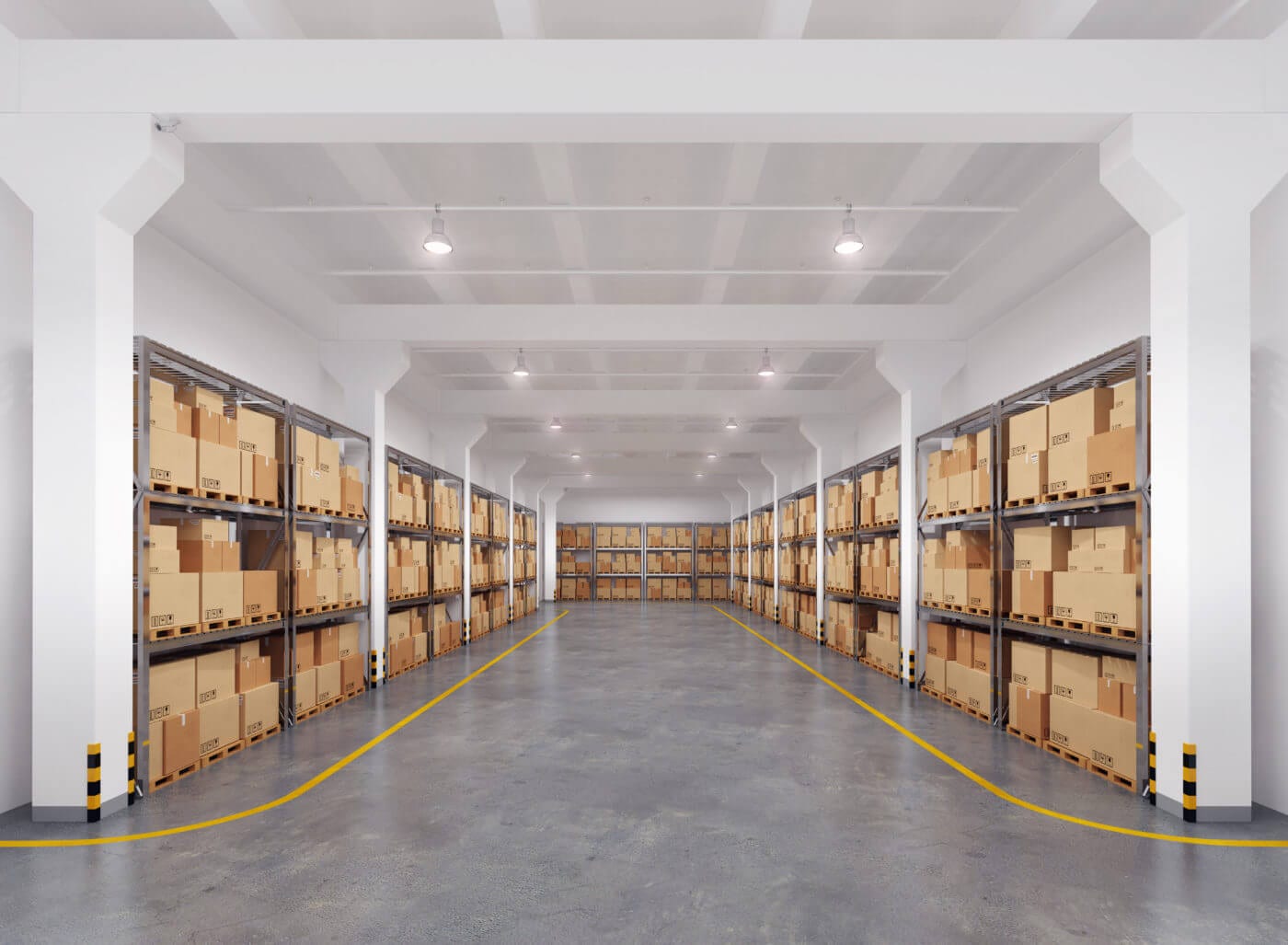 Interior of a spacious warehouse featuring neatly stacked cardboard boxes on metal shelving, with bright lighting and a clean, organized layout.