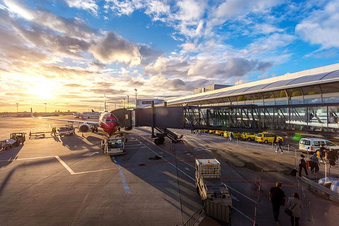 A plane unloading at an airport.