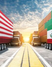 Freight trucks with containers featuring the flags of the United States and Mexico, representing cross-border trade and international logistics.