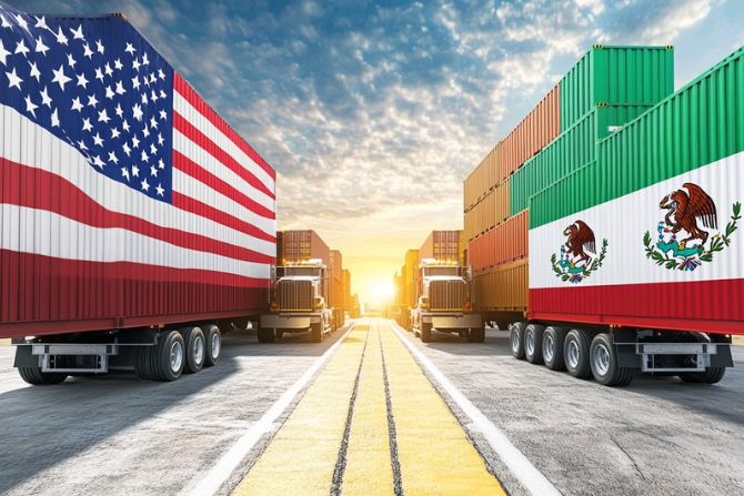 Freight trucks with containers featuring the flags of the United States and Mexico, representing cross-border trade and international logistics.