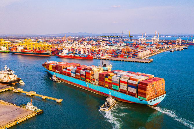 Ocean freight forwarder coordinating container vessel arrival at international port