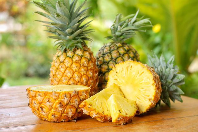 Pineapple in a wood table