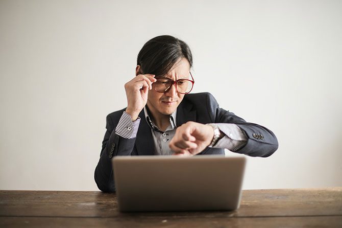 A person looking at a watch