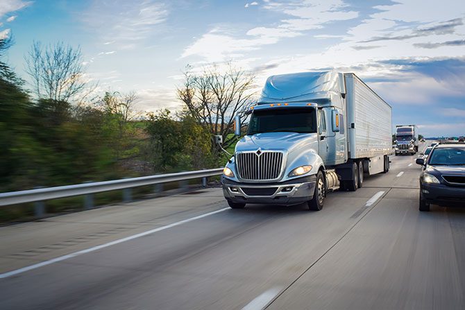 diesel truck semi tractor trailer on the highway